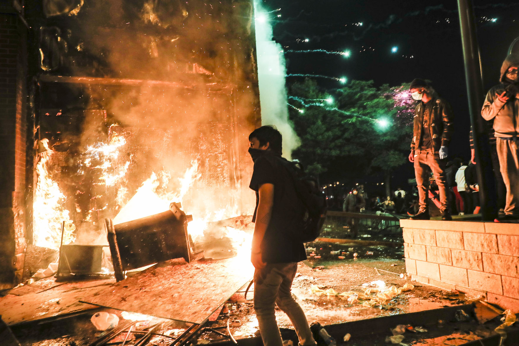 George Floyd protesters set Minneapolis police station afire